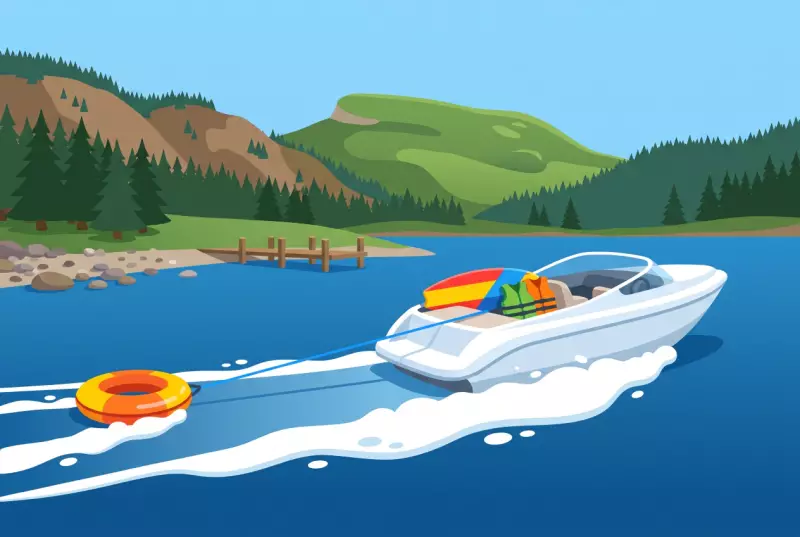Illustration d'un bateau de wakesurf et d'une bouee tractee sur le lac de Joux au Rocheray