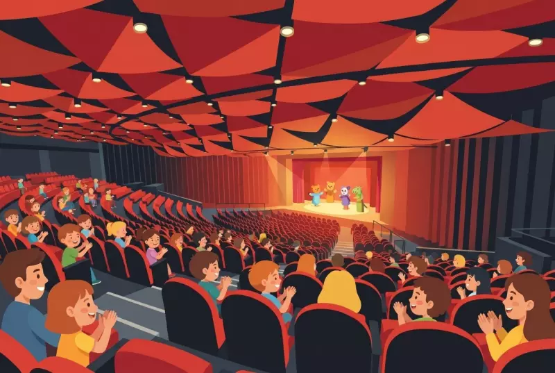 Illustration de la salle du Théâtre de Beausobre à Morges : enfants et parents dans les fauteuils rouges applaudissant un spectacle de marionnettes sur la scène éclairée, sous le plafond aux voiles acoustiques rouges.